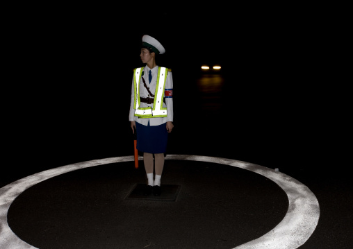 North Korean female traffic security officer in the night, Pyongan Province, Pyongyang, North Korea