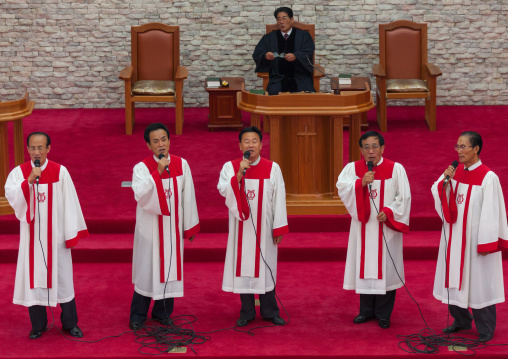 North Korean men singing in protestant Bongsu church, Pyongan Province, Pyongyang, North Korea