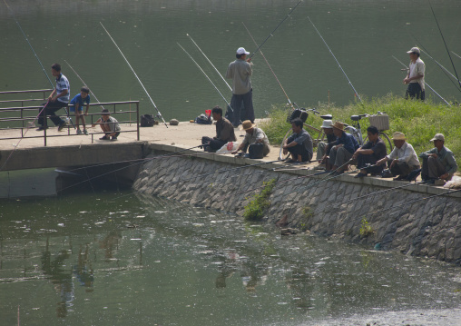 North Korean men fishing in a lake, Pyongan Province, Pyongyang, North Korea