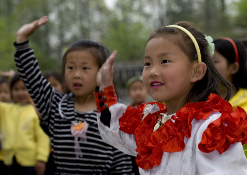 North Korean children waving hands, North Hwanghae Province, Kaesong, North Korea