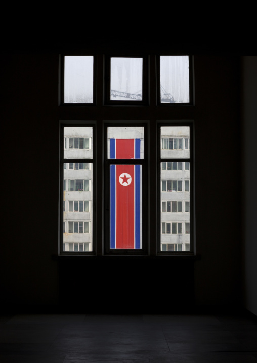 National flag seen thru the window of building, Pyongan Province, Pyongyang, North Korea