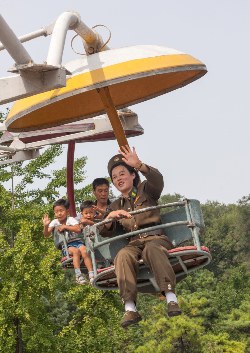 North Korean soldier on an attraction in Taesongsan funfair, Pyongan Province, Pyongyang, North Korea