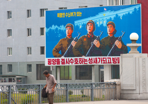 Propaganda billboard in the street with North Korean soldiers, Pyongan Province, Pyongyang, North Korea