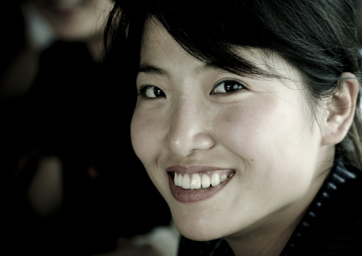Portrait of a smiling North Korean woman, Pyongan Province, Pyongyang, North Korea