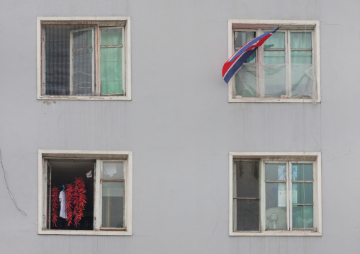 National flag on the window of a residential building, Pyongan Province, Pyongyang, North Korea