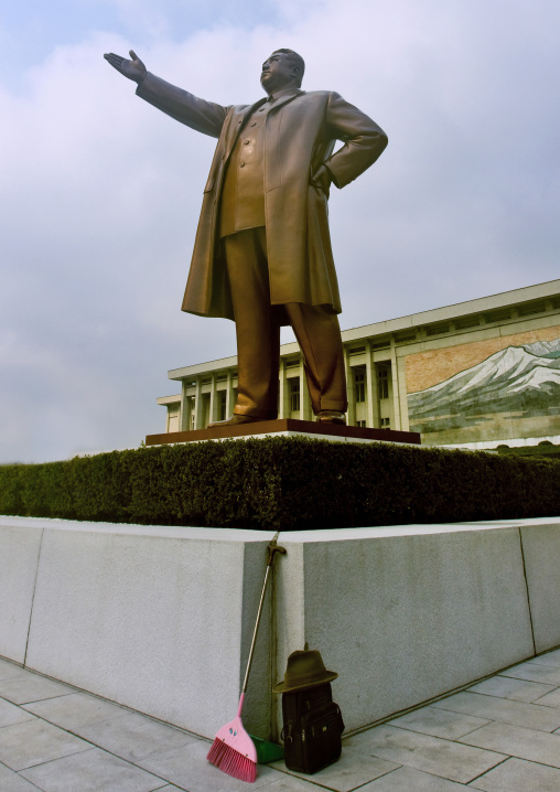 Broom in front of Kim il Sung statue in the Grand monument on Mansu hill, Pyongan Province, Pyongyang, North Korea