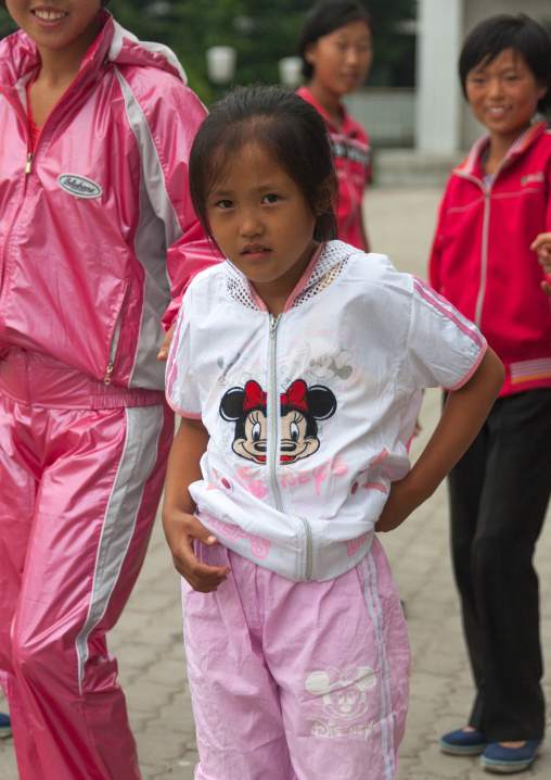 Young North Korean girl with a Minnie mouse logo on her vest in the Songdowon international children's camp, Kangwon Province, Wonsan, North Korea