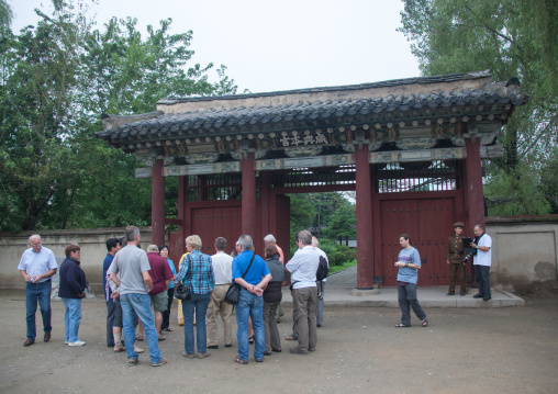 Tourists in front of the former royal villa of Ri Song Gye founder of the choson dynasty, South Hamgyong Province, Hamhung, North Korea