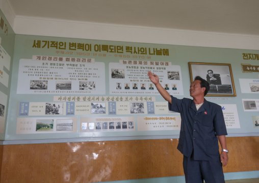 North Korean man in a farm museum, South Hamgyong Province, Hamhung, North Korea