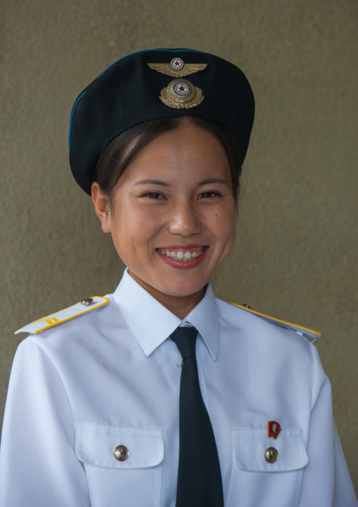 Smiling North Korean airport employee, South Hamgyong Province, Hamhung, North Korea