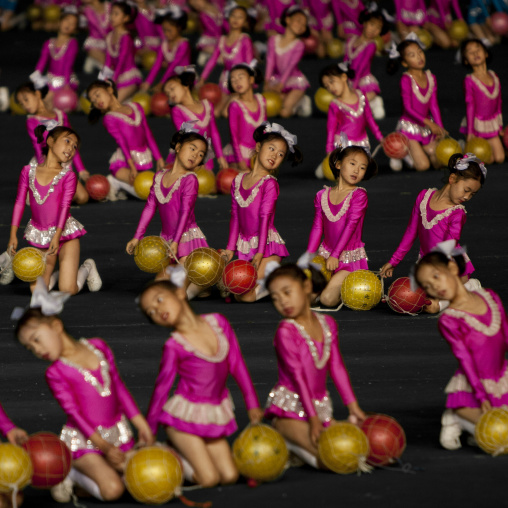 North Korean children performing with balloons during the Arirang mass games in may day stadium, Pyongan Province, Pyongyang, North Korea
