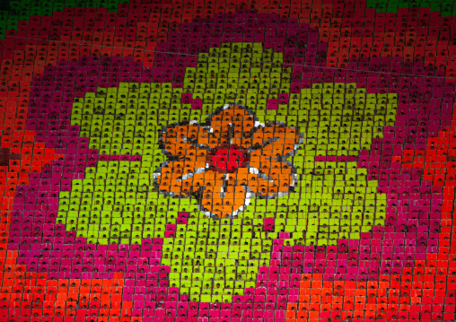 Flower made by children pixels holding up colored boards during Arirang mass games in may day stadium, Pyongan Province, Pyongyang, North Korea