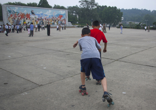 North Korean children roller skating in town, Pyongan Province, Pyongyang, North Korea
