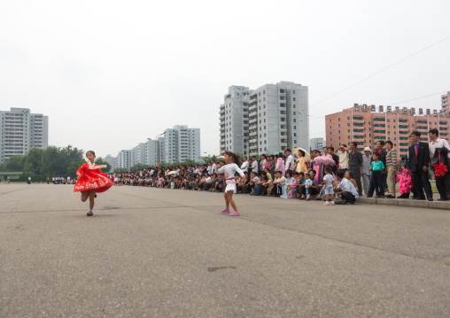 North Korean young girls dancing in traditional choson-ot on national day, Pyongan Province, Pyongyang, North Korea