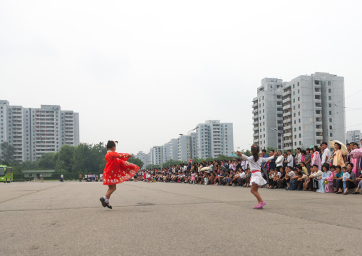 North Korean young girls dancing in traditional choson-ot on national day, Pyongan Province, Pyongyang, North Korea