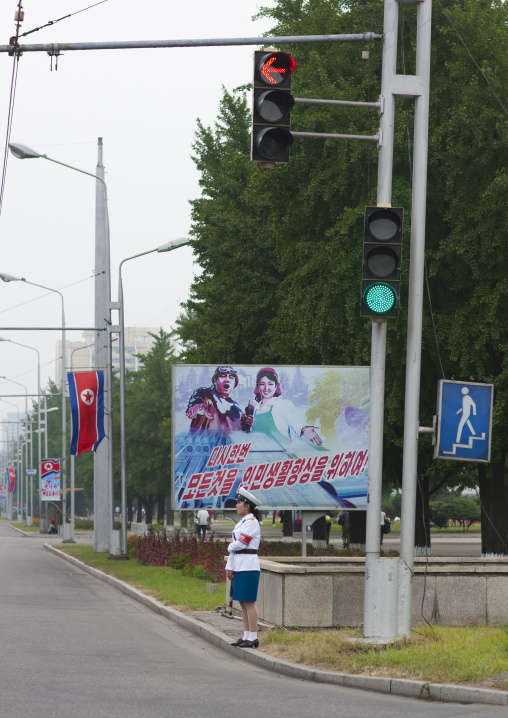 North Korean female traffic security officer near traffic lights, Pyongan Province, Pyongyang, North Korea