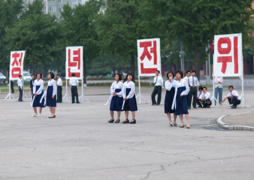 Propaganda billboards during a mass dance performance on september 9 day of the foundation of the republic, Pyongan Province, Pyongyang, North Korea