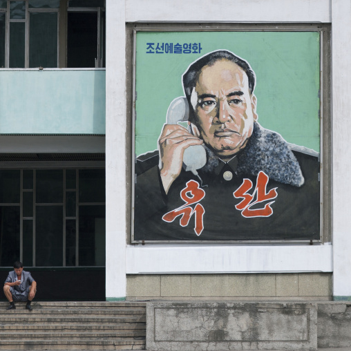 North Korean military man on the phone on a movie poster, Pyongan Province, Pyongyang, North Korea