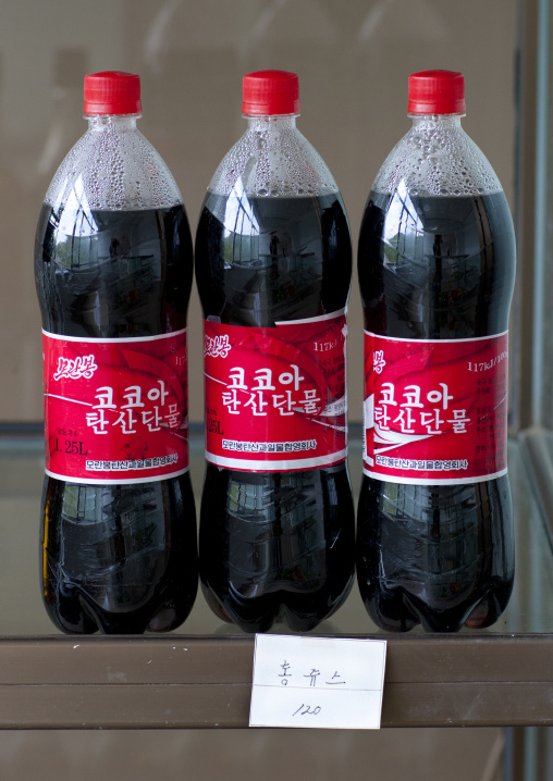 Three large bottles of North Korean coca cola named cocoa soda, Pyongan Province, Pyongyang, North Korea