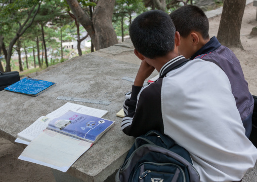 North Korean children studying english in a park, North Hwanghae Province, Kaesong, North Korea