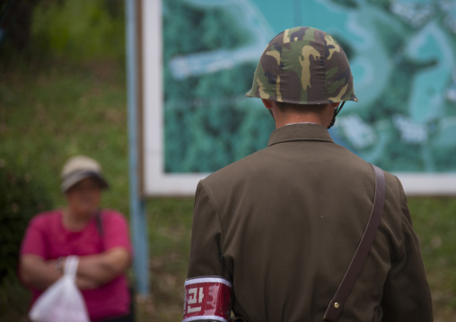 North Korean soldier with a tourist in the Demilitarized Zone, North Hwanghae Province, Panmunjom, North Korea
