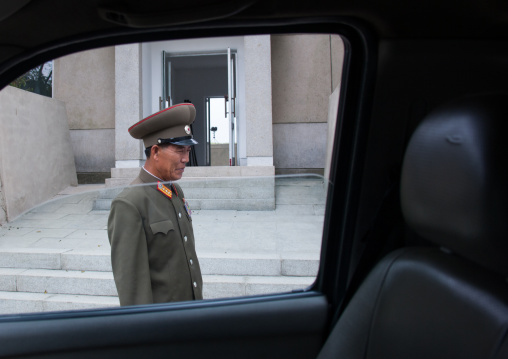 North Korean officer in the joint security area of the Demilitarized Zone seen thru a car window, North Hwanghae Province, Panmunjom, North Korea
