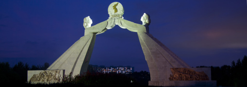 Arch of reunification monument by night, Pyongan Province, Pyongyang, North Korea