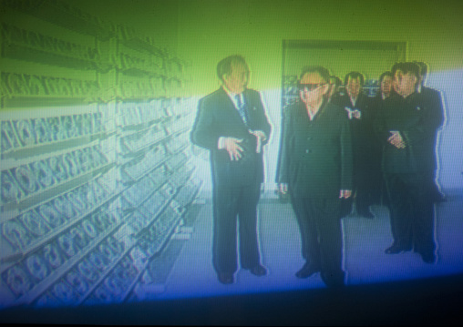 Kim Jong il and Kim Jong un on North Korean television during an official visit, Pyongan Province, Pyongyang, North Korea