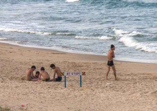 North Korean boys having fun at the beach, North Hamgyong Province, Chilbo Sea, North Korea