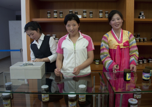 Saleswomen in a supermarket in the former meeting point between families from North and south, Kangwon-do, Kumgang, North Korea