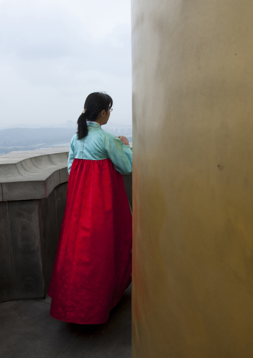 North Korean woman guide at the top of the Juche tower built to commemorate Kim il-sung's 70th birthday, Pyongan Province, Pyongyang, North Korea