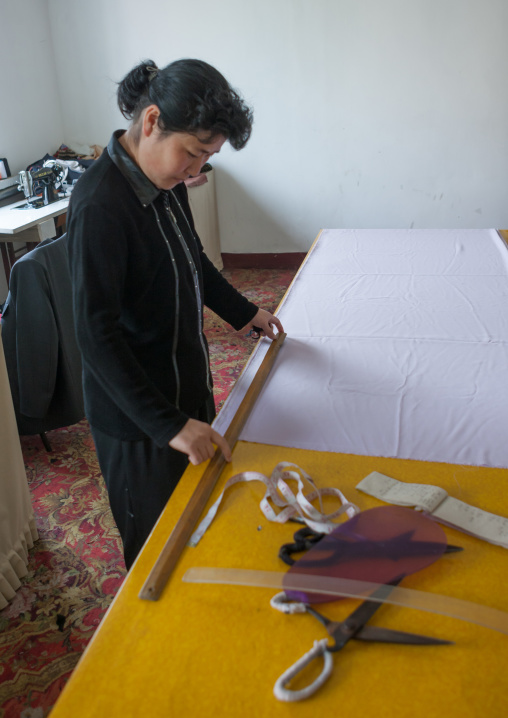 North Korean tailor in her workshop, South Pyongan Province, Chongsan-ri Cooperative Farm, North Korea