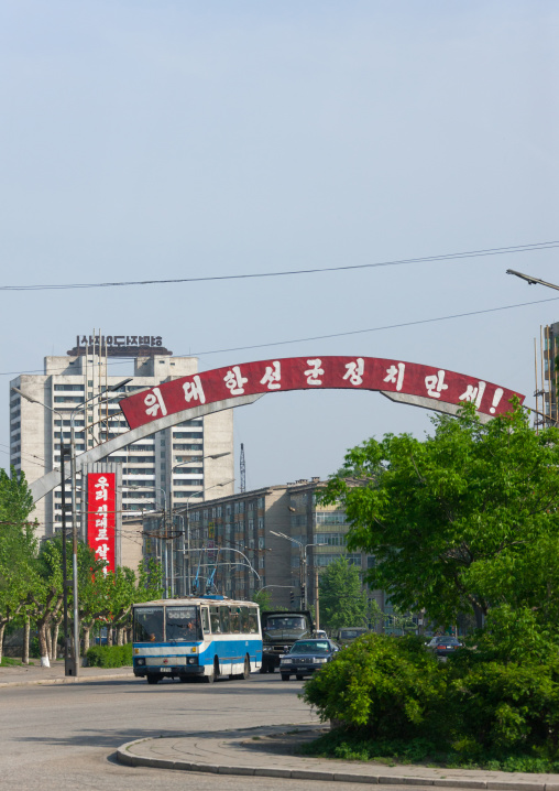 Red propaganda billboard over a road about songun military first policy, Pyongan Province, Pyongyang, North Korea