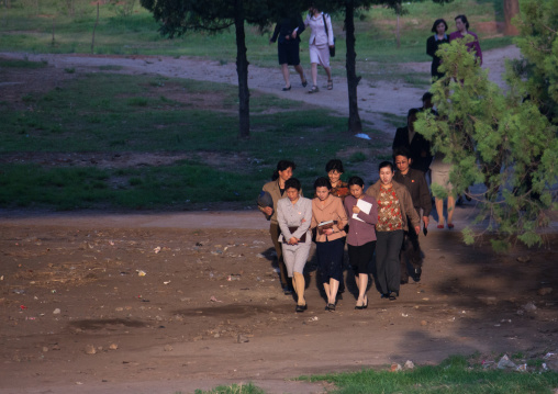North Korean women walking in a park, Pyongan Province, Pyongyang, North Korea