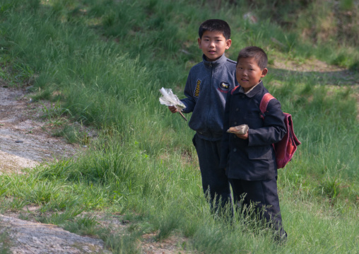 Portrait of North Korean boys coming back from school, North Hwanghae Province, Kaesong, North Korea