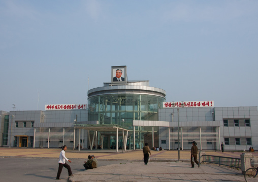 Modern train station with the portrait of Kim Il-sung at the top, North Hwanghae Province, Kaesong, North Korea