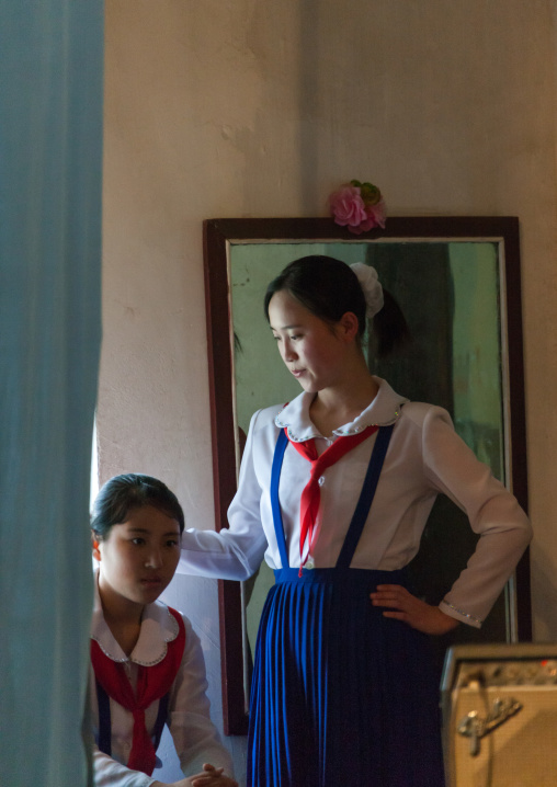 North Korean pioneers teenage girls backstage before a show in their college, Pyongan Province, Pyongyang, North Korea