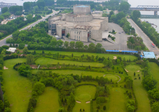 View on the golf course and cinema hall on Yanggakdo island, Pyongan Province, Pyongyang, North Korea