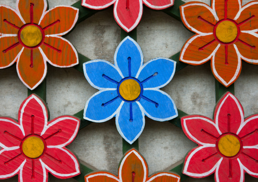 Detail of a colorful flowers on the door of Kwangbok temple, Pyongan Province, Pyongyang, North Korea