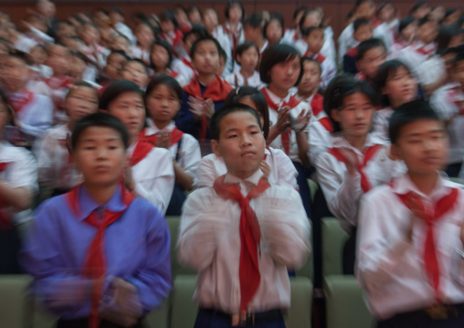 Crowd of North Korean teenage spectators applauding in the Mangyongdae children's palace, Pyongan Province, Pyongyang, North Korea