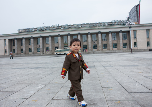 North Korean boy dressed as a soldier in Kim il Sung square, Pyongan Province, Pyongyang, North Korea