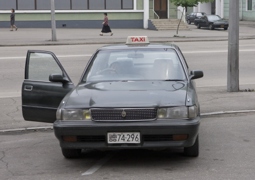 North Korean taxi parked in the street, Pyongan Province, Pyongyang, North Korea