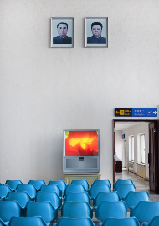Airport departure lounge with the portraits of the Dear Leaders, Pyongan Province, Pyongyang, North Korea