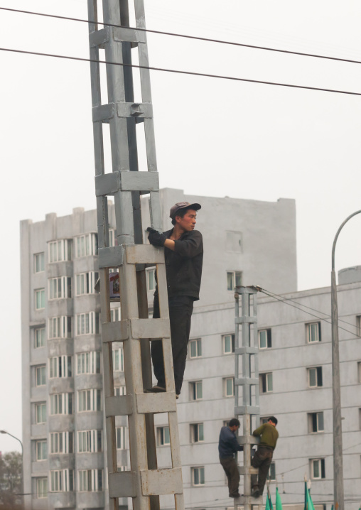North Korean workers repairing phone lines, Pyongan Province, Pyongyang, North Korea