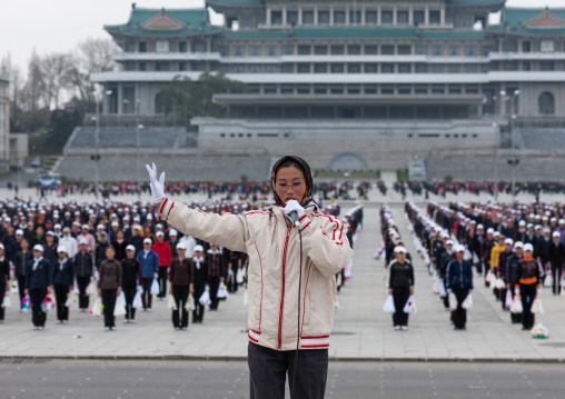 Young North Korean women during a mass games rehearsal in Kim il Sung square, Pyongan Province, Pyongyang, North Korea