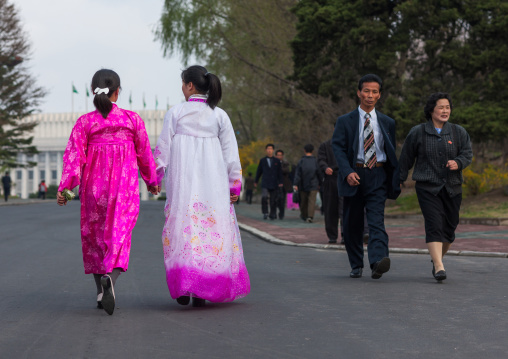 North Korean people with traditional and modern clothes in the street, Pyongan Province, Pyongyang, North Korea