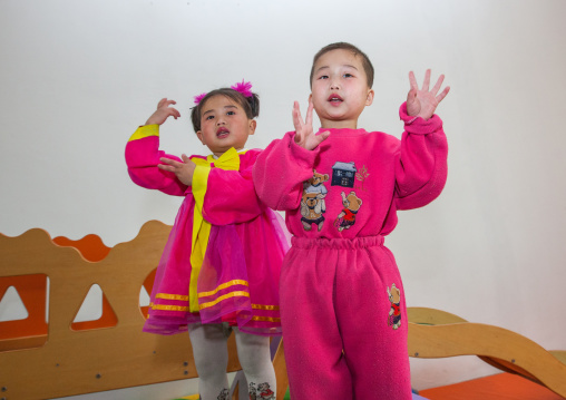 North Korean children in an orphanage singing a patriotic song, South Pyongan Province, Nampo, North Korea