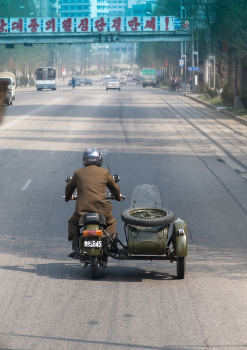 Soldier on a honda side car in the city center, Pyongan Province, Pyongyang, North Korea