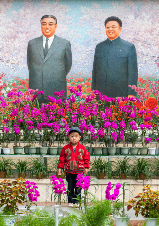 North Korean boy posing in the international Kimilsungia and Kimjongilia festival, Pyongan Province, Pyongyang, North Korea