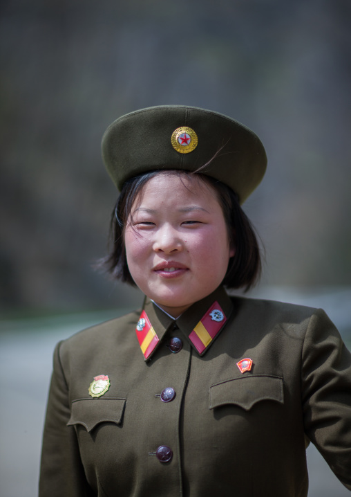 Smiling North Korean female soldier, Kangwon Province, Wonsan, North Korea